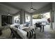 Relaxing patio with seating area, pool view, and outdoor kitchen at 10040 N 78Th Pl, Scottsdale, AZ 85258