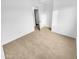 Spacious bedroom with neutral carpeting and a large closet at 12517 W Rosewood Dr, El Mirage, AZ 85335