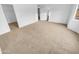 Spacious carpeted bedroom with walk-in closet at 12517 W Rosewood Dr, El Mirage, AZ 85335