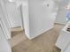 Upstairs hallway with carpet and access to bedrooms at 12517 W Rosewood Dr, El Mirage, AZ 85335