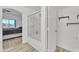 Clean bathroom with shower/tub and additional storage at 13638 W Desert Flower Dr, Goodyear, AZ 85395