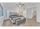 Spacious primary bedroom with plush carpet and lots of natural light at 13638 W Desert Flower Dr, Goodyear, AZ 85395