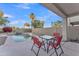 Patio furniture near the pool and backyard at 13638 W Desert Flower Dr, Goodyear, AZ 85395