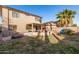 Spacious backyard with patio furniture and a grill at 13829 W Rovey Ave, Litchfield Park, AZ 85340