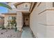 Front entry with tile flooring and a decorative wreath at 13829 W Rovey Ave, Litchfield Park, AZ 85340