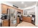 Modern kitchen with stainless steel appliances at 13829 W Rovey Ave, Litchfield Park, AZ 85340