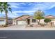 Charming single-story home featuring desert landscaping, a two-car garage, and a well-maintained front yard at 17202 N Javelina Dr, Surprise, AZ 85374
