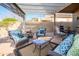 Inviting covered patio with comfortable seating, perfect for outdoor relaxation and entertaining friends and Gathering at 17202 N Javelina Dr, Surprise, AZ 85374