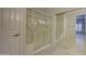 Bathroom with a large shower and tiled floor at 17733 N Escalante Ln, Surprise, AZ 85374