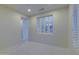 Bedroom with window shutters and carpeted floor at 17733 N Escalante Ln, Surprise, AZ 85374