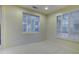 Bright bedroom with window shutters and carpeted floor at 17733 N Escalante Ln, Surprise, AZ 85374
