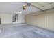 Attached garage with storage cabinets and water heater at 17733 N Escalante Ln, Surprise, AZ 85374