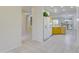 View of kitchen and hallway with tile flooring at 17733 N Escalante Ln, Surprise, AZ 85374