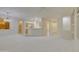 Open kitchen boasts a breakfast bar and ample wood cabinetry at 17733 N Escalante Ln, Surprise, AZ 85374
