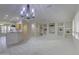 Bright and airy living room featuring recessed shelves and neutral decor at 17733 N Escalante Ln, Surprise, AZ 85374