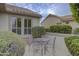 Cozy patio with a metal table and chairs, perfect for outdoor dining at 17733 N Escalante Ln, Surprise, AZ 85374