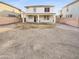 Large backyard with grassy area and covered patio at 18164 W Smokey Dr, Surprise, AZ 85388