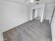 Bedroom with mirrored closet doors and carpet at 18164 W Smokey Dr, Surprise, AZ 85388