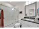 Guest bathroom with tub shower combo and vanity at 18324 E Spring Valley Ct, Rio Verde, AZ 85263