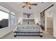 Main bedroom with rustic wood bed frame and ensuite bathroom at 18324 E Spring Valley Ct, Rio Verde, AZ 85263