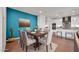 Dining area with a wood table and seating for four at 18324 E Spring Valley Ct, Rio Verde, AZ 85263