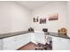 Bright home office features built-in desk and cabinets at 18324 E Spring Valley Ct, Rio Verde, AZ 85263