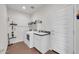 Laundry room with washer, dryer, and utility sink at 18324 E Spring Valley Ct, Rio Verde, AZ 85263