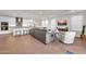 Open living space with contemporary furnishings and kitchen island at 18324 E Spring Valley Ct, Rio Verde, AZ 85263