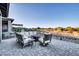 Patio with seating area and fire pit at 18324 E Spring Valley Ct, Rio Verde, AZ 85263