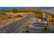 Backyard patio with fire pit and mountain views at 18324 E Spring Valley Ct, Rio Verde, AZ 85263