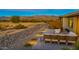 Backyard patio with fire pit and mountain views at 18324 E Spring Valley Ct, Rio Verde, AZ 85263