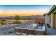 Backyard patio with fire pit and mountain views at 18324 E Spring Valley Ct, Rio Verde, AZ 85263