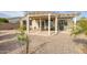 Spacious backyard with pergola and grassy area at 19043 N Aztec Point Dr, Surprise, AZ 85387