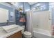 Updated bathroom with a modern vanity and a shower/tub combo at 19043 N Aztec Point Dr, Surprise, AZ 85387