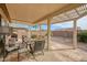Covered patio with seating area, perfect for outdoor relaxation at 19043 N Aztec Point Dr, Surprise, AZ 85387