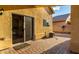 Covered patio with brick pavers, offering an outdoor entertaining space at 2042 E Victor Rd Rd, Gilbert, AZ 85296