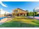 Large backyard with pool, basketball court, and patio at 2042 E Victor Rd Rd, Gilbert, AZ 85296