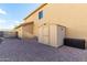 Spacious backyard with storage shed and patio at 2042 E Victor Rd Rd, Gilbert, AZ 85296