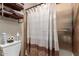 Bathroom with shower stall and linen shelving at 2042 E Victor Rd Rd, Gilbert, AZ 85296