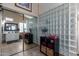 Bathroom with glass block shower and mirrored closet at 2042 E Victor Rd Rd, Gilbert, AZ 85296