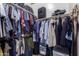Large walk-in closet with double hanging rods at 2042 E Victor Rd Rd, Gilbert, AZ 85296