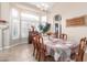 Bright dining room with wood table and chairs at 2042 E Victor Rd Rd, Gilbert, AZ 85296