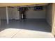 Garage with epoxy flooring and overhead storage at 2042 E Victor Rd Rd, Gilbert, AZ 85296