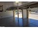 Two-car garage with epoxy floor and overhead storage at 2042 E Victor Rd Rd, Gilbert, AZ 85296