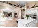 Island kitchen with high ceilings and open floorplan at 2042 E Victor Rd Rd, Gilbert, AZ 85296