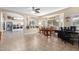 Kitchen with island and white cabinets at 2042 E Victor Rd Rd, Gilbert, AZ 85296