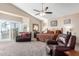Large main bedroom with sitting area and balcony access at 2042 E Victor Rd Rd, Gilbert, AZ 85296