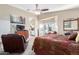 Spacious main bedroom with access to bathroom and balcony at 2042 E Victor Rd Rd, Gilbert, AZ 85296
