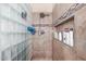 Clean shower with glass block wall and built-in shelf at 2042 E Victor Rd Rd, Gilbert, AZ 85296