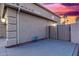 Side yard with gate and concrete pathway at 2042 E Victor Rd Rd, Gilbert, AZ 85296